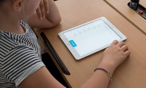 girl watching tablet